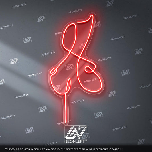 Neon sign of a female body, perfect for art lovers and stylish decor.